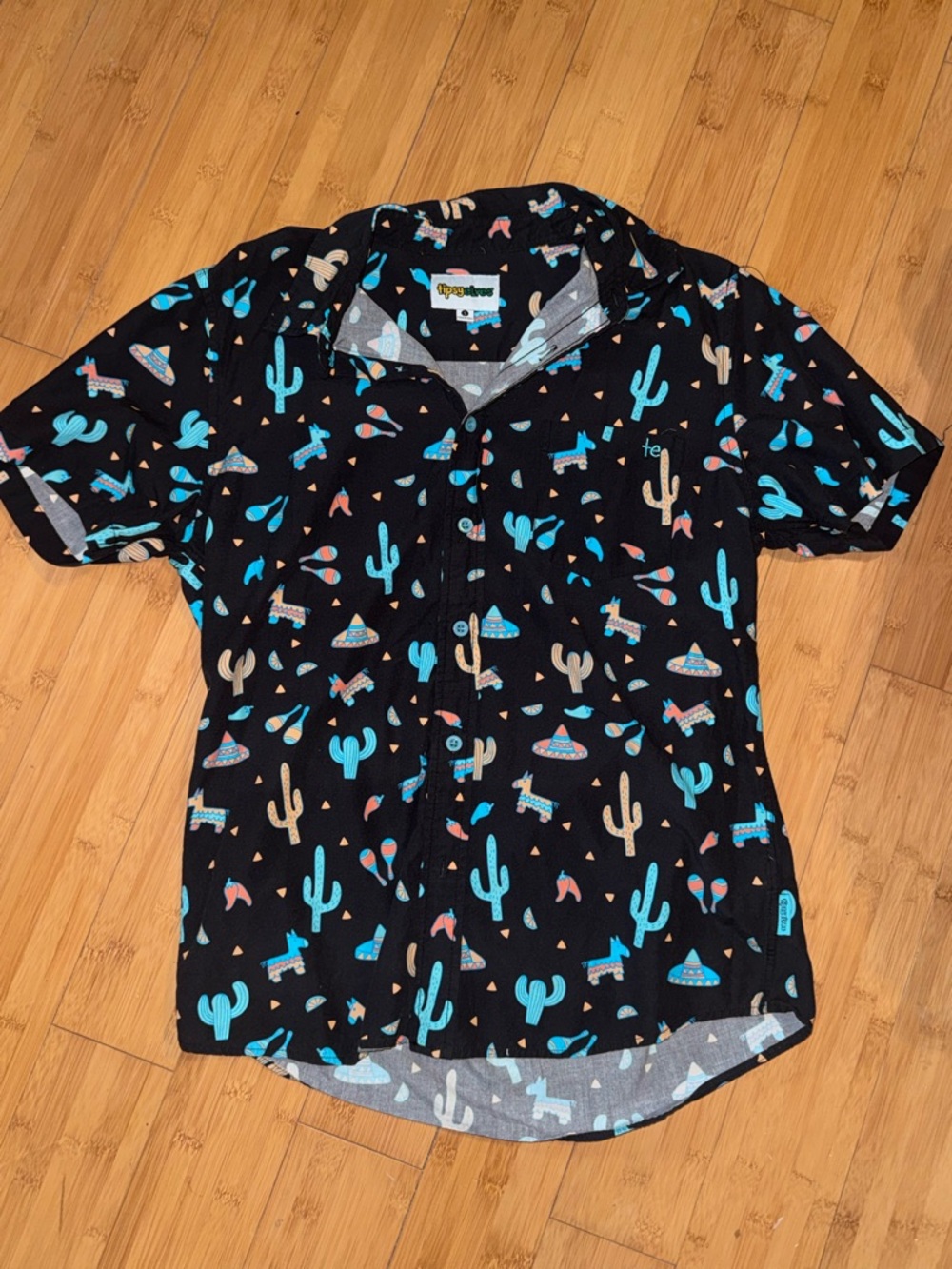 Tipsy Elves Black Shirt with Turquoise & Peach Piñata Print